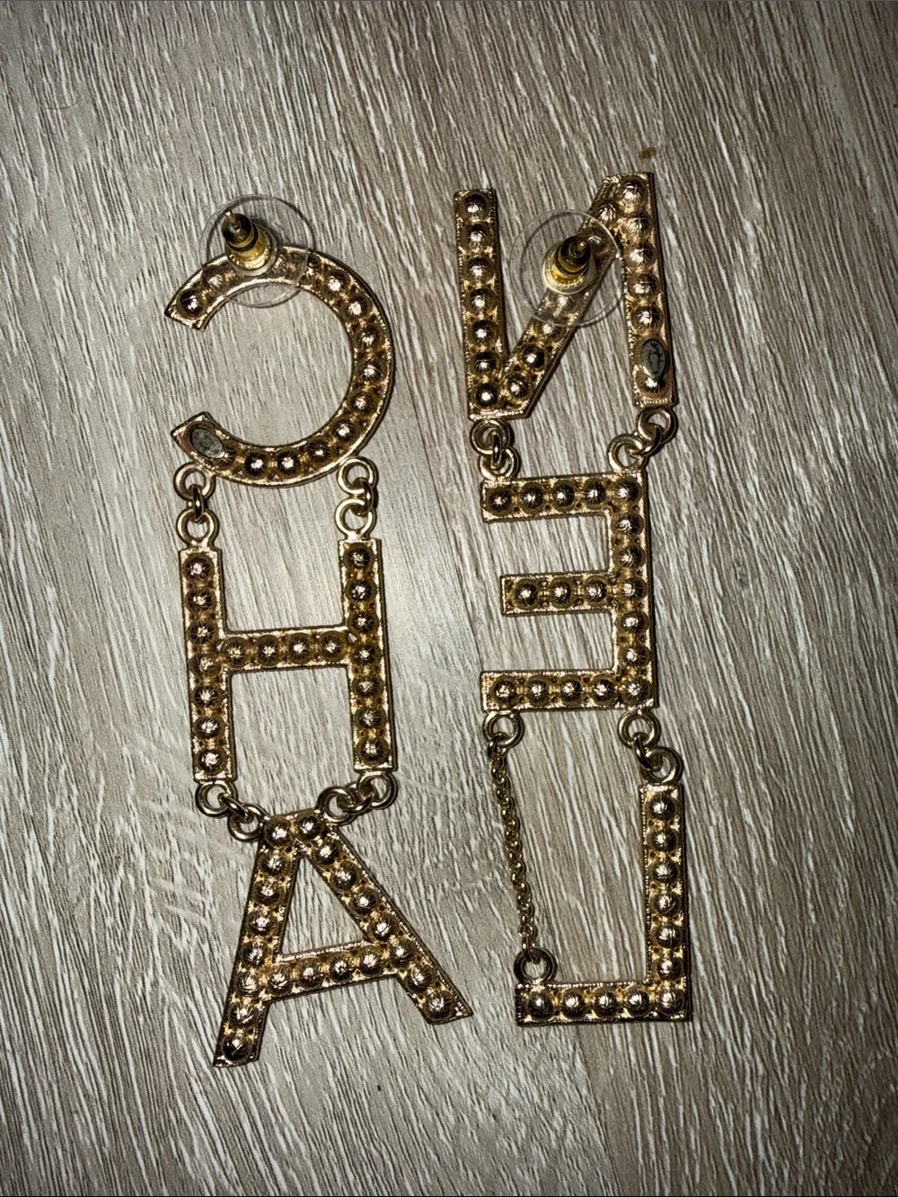 CHANEL Gold Crystal Logo Dangle Earrings